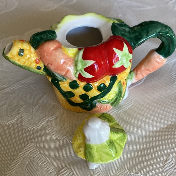 Tiny 3 1/2” vegetables in basket porcel, 2 pc. teapot w/ fitted lid.   $20 - Picture 3 of 5